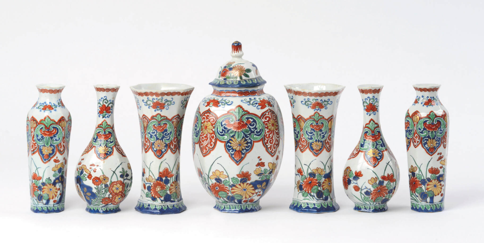 Polychrome petit feu and gilded garniture