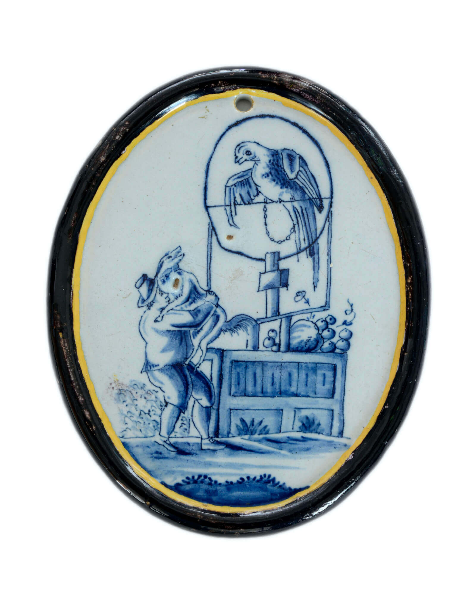 Delftware plaque with bird